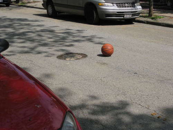 Apparently this Spalding basketball ball is just painted on the street, though...