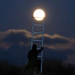 Reaching for the Moon Optical Illusion