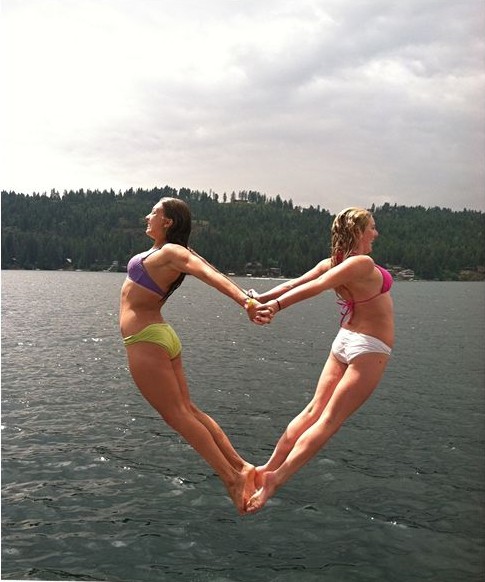 Jumping Girls Forming Heart Optical Illusion