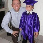 little graduate with a big hand optical illusion