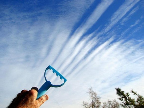 raking the sky optical illusion