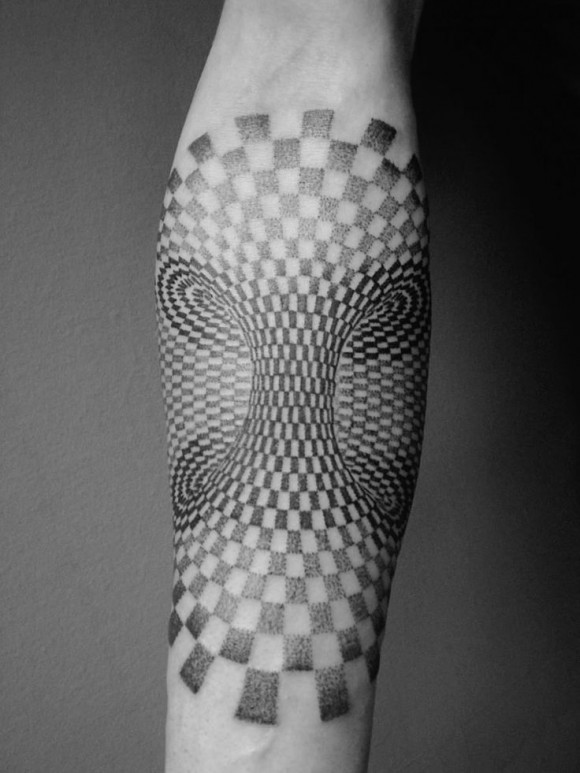 Black and White Tattooed Arm Optical Illusion