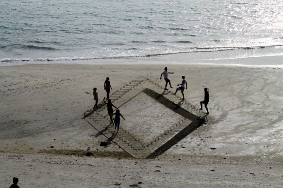 Climbing Stairs on the Beach Optical Illusion