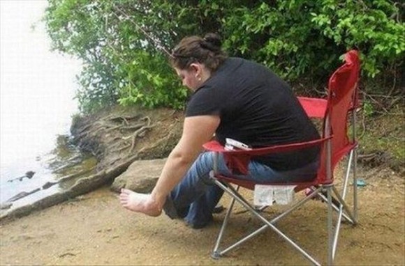 Lady with a foot on her arm optical illusion