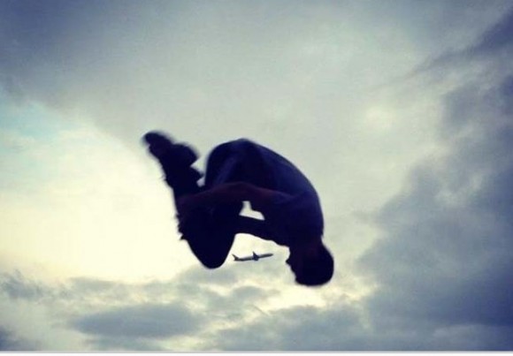 Man Jumping Over a Plane Optical Illusion