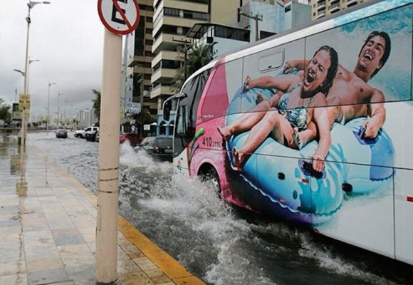 Couple Riding the Wave Optical Illusion