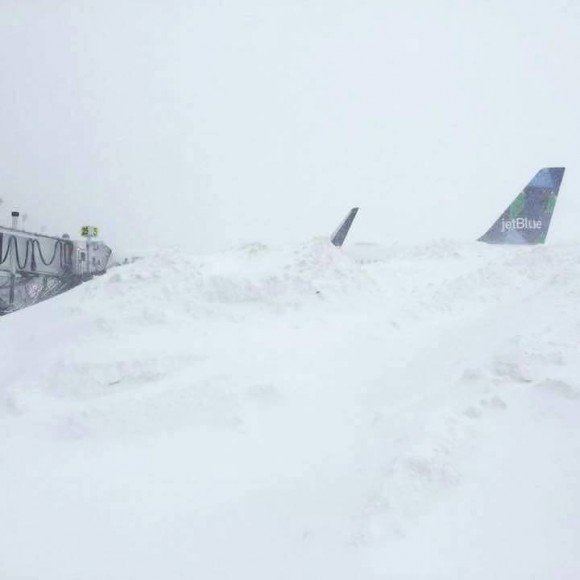 jetblue plane buried in snow