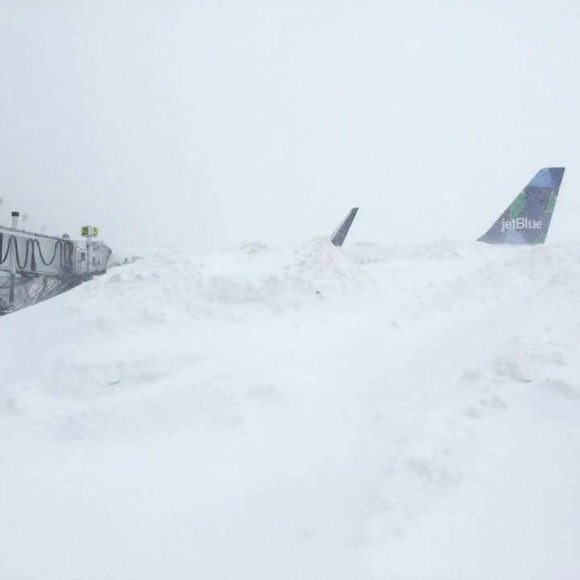 jetblue plane buried in snow