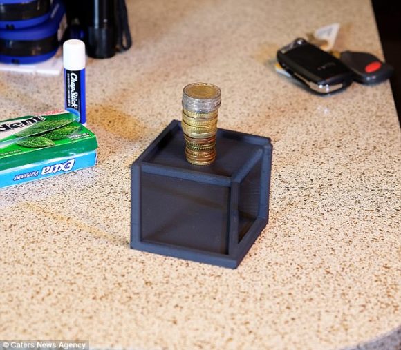 coins stacked on a flat box